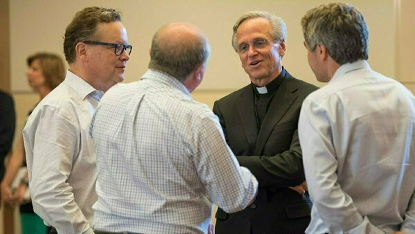 Father Jenkins in discussion after 2018 faculty address